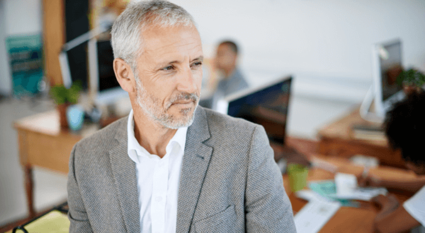 A business professional in an office stock photo
